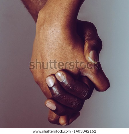 People Holding Hands Together  for Friendship. Hands of happy couple of African people which stay together.