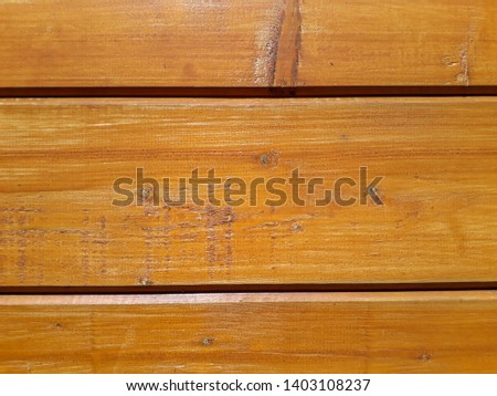 Texture of wooden boards made from noble varieties of wood. Background and pattern for interior and exterior design. Natural tree in high resolution