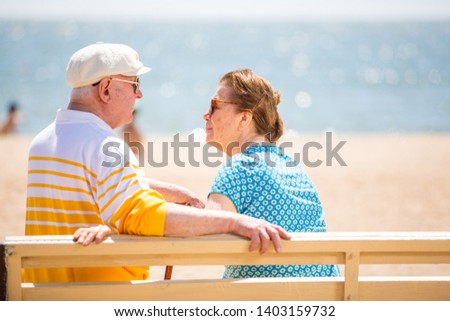 family, age, travel, tourism and people concept - Senior couple rest at tropical resort near sea