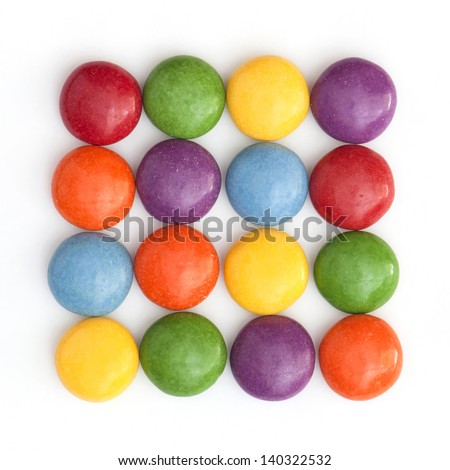 Colored smarties stored in a square. Royalty-Free Stock Photo #140322532