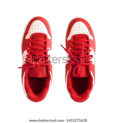 Top view of red gumshoes or skate shoes isolated on white background