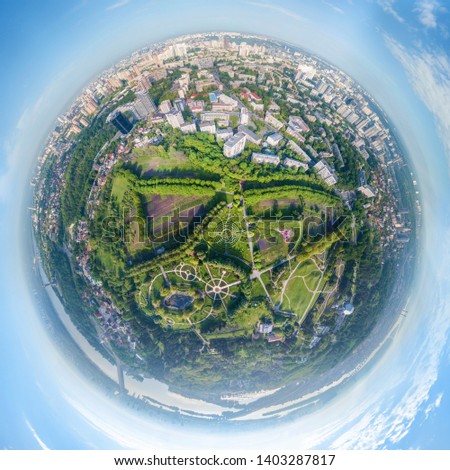Globe panorama. stereographic projection of  green park and ciy view. 360 degree panorama. little planet 