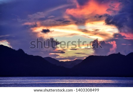 sunrise over praslin island seen from la digue island in Seychelles 