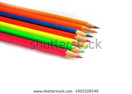 Colour pencils isolated on white background close up.                    