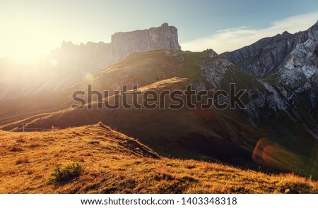 Unsurpassed sunrise in the mountains. Dramatic sunset in dolomites alp mountain from peak under sunlight. Amazing nature landscape. Picture of wild area. wonderful picturesque Scene
