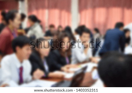 Abstract blur background Conference concept, Business man or student are seminar on the impact of political, In the hall or classroom of University.Exchange of knowledge develop to be successful. 