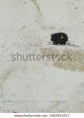graffiti hedgehog on the wall of the house