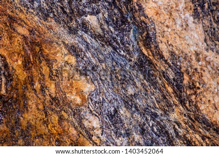 Stone background. Perfect to webpages.Background of natural stone, brown stone, close-up.