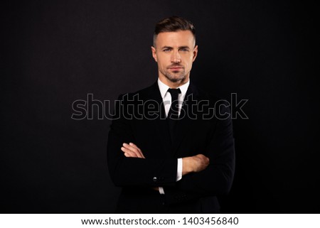 Portrait of his he nice-looking attractive chic content guy financial director economist attorney lawyer shark expert experienced skilled specialist banker folded arms isolated over black background