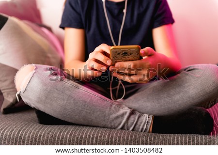 Teenage girl with mobile phone	
