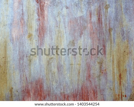
Beautiful abstract background in the form of a multi-colored metal surface.					