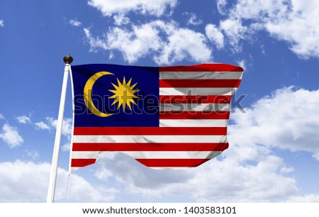 Malaysian flag mockup fluttering in the wind. Country in Southeast Asia, occupies parts of the Malaysian Peninsula and Borneo Island. The capital Kuala Lumpur, iconic Petronas Twin Towers, skyscrapers