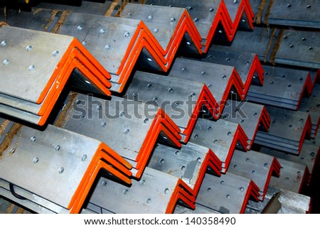 Steel angle bunch on the rack in warehouse