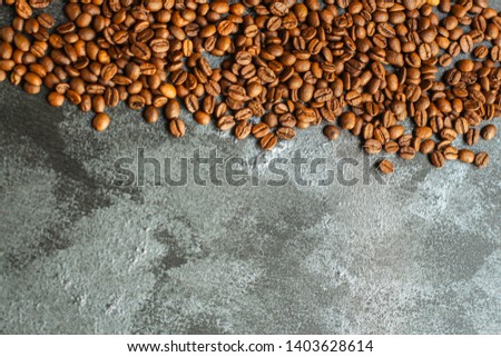coffee beans (good and bad grain) - arabica and robusta blend (roasted coffee grain). Black background. Top view
. Copy space
