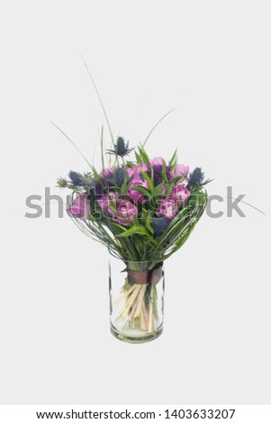 Beautiful bouquet with pink flowers close up.