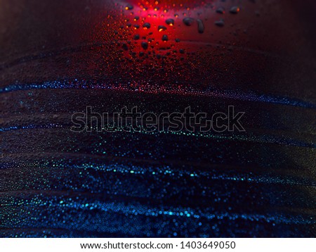 close up water drop and light abstract background