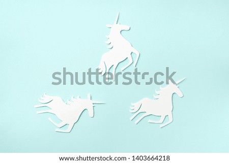 Creative unicorn pattern on blue background. Abstract art texture Minimal fantasy concept. Banner. Top view.
