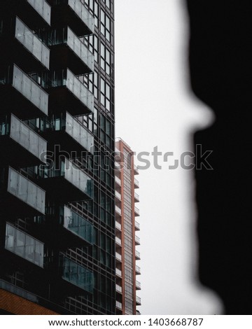 Abstract view of a modern building in Toronto on a cloudy day