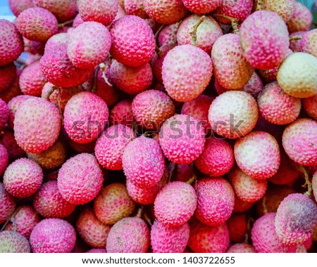 Fresh red lychee fruit at the fruit market