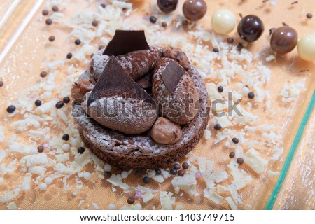 Belgian chocolate cake on brownie cream and white chocolate