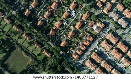 Aerial top-down shot of houses and villas in Rosignano Solvay, Italy