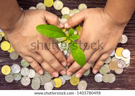 Trees with money, saving money and growing hands.