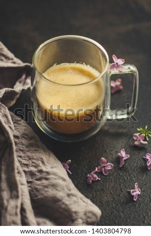 coffee with milk (cappuccino). food background. top