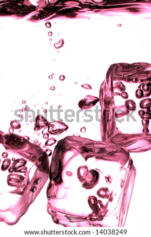 red ice cubes in clear water