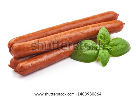 Smoked Pork Sausages with basil leaves, close-up, isolated on white background.