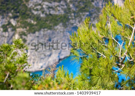 Abstract background with sea, rocks and pines. Picture for desktop.