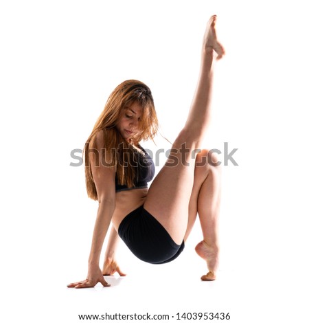 Young dance girl over isolated white background
