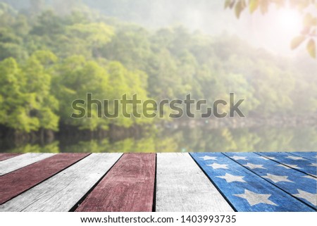 Independence Day, 4th july, Veterans Day, Presidents day, Patriotic USA flag on table top by the lake for background