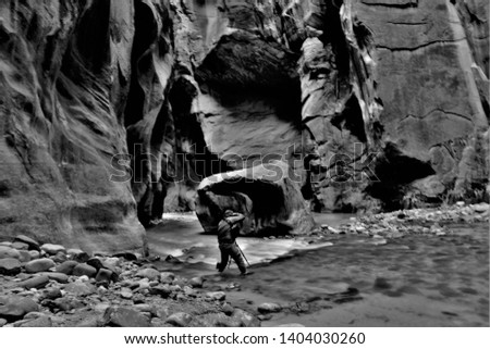 Blurred picture of 
Photographers are shooting large stones in the water.Zion,USA