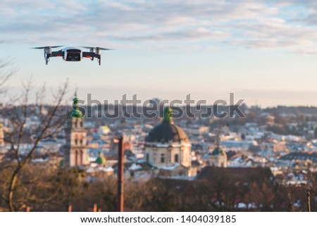 drone close up city on sunset on background. copy space