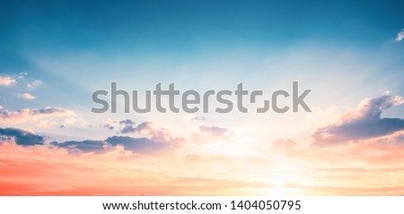 Background of colorful sky concept: Dramatic sunset with twilight color sky and clouds Royalty-Free Stock Photo #1404050795