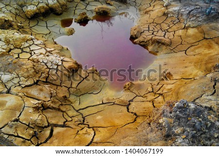 Contaminated Soil due to Irresponsible Industry Royalty-Free Stock Photo #1404067199