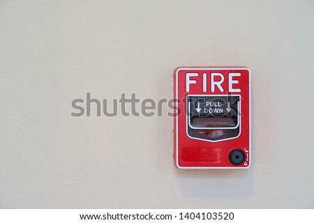 Fire or smoke alarm switch on wall