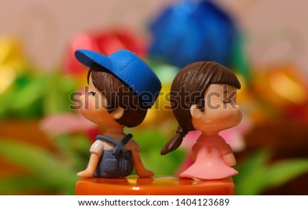 boy and girl playing with toys
