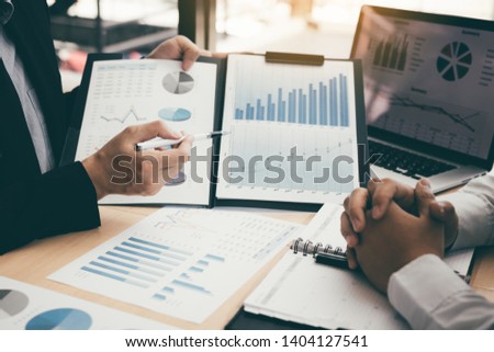 Business people discussing with colleagues with entrepreneurs are planning finance in office room. Royalty-Free Stock Photo #1404127541