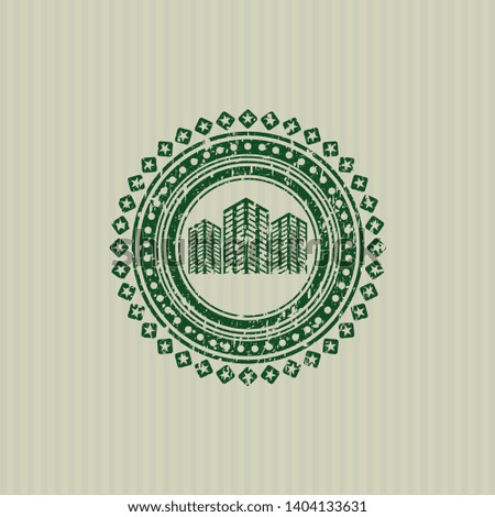 Green buildings icon inside distressed grunge seal