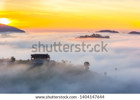 Beautiful Sunrise and the mist at Khao Kho, Phetchabun Province, Thailand. Royalty-Free Stock Photo #1404147644