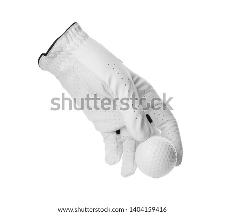 Glove and golf ball on white background