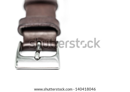Focus on pin of brown watchband on white isolate background