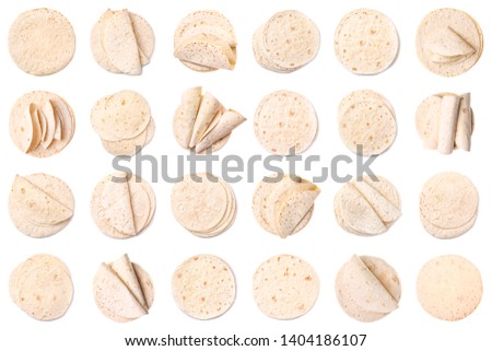 Set of delicious tortillas on white background, top view. Unleavened bread