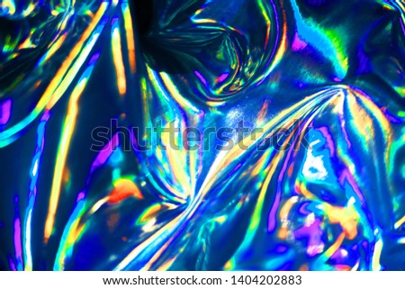 Holographic iridescent abstract blurred surface. Holographic gradient background.