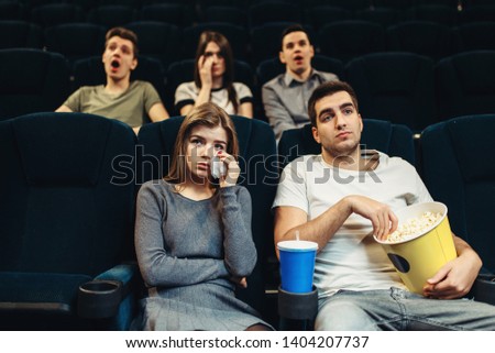 Boring film concept, people watching movie