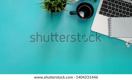 Creative flat lay pastel image of workspace desk and office supplies