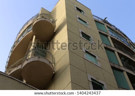 balcony - serving on the upper floors of the building area with railings.