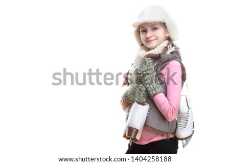 Portrait of Positive Smiling Caucasian Blond Girl in Winter Clothes. Posing Half-Turned with Ice Skates Over Shoulder In Hands In Front. Against White.Horizontal image