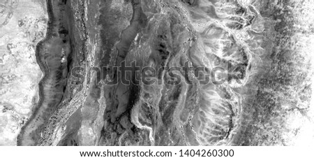the border, allegory, abstract photography of the deserts of Africa from the air in black and white,  Genre: Abstract Naturalism, from the abstract to the figurative, 